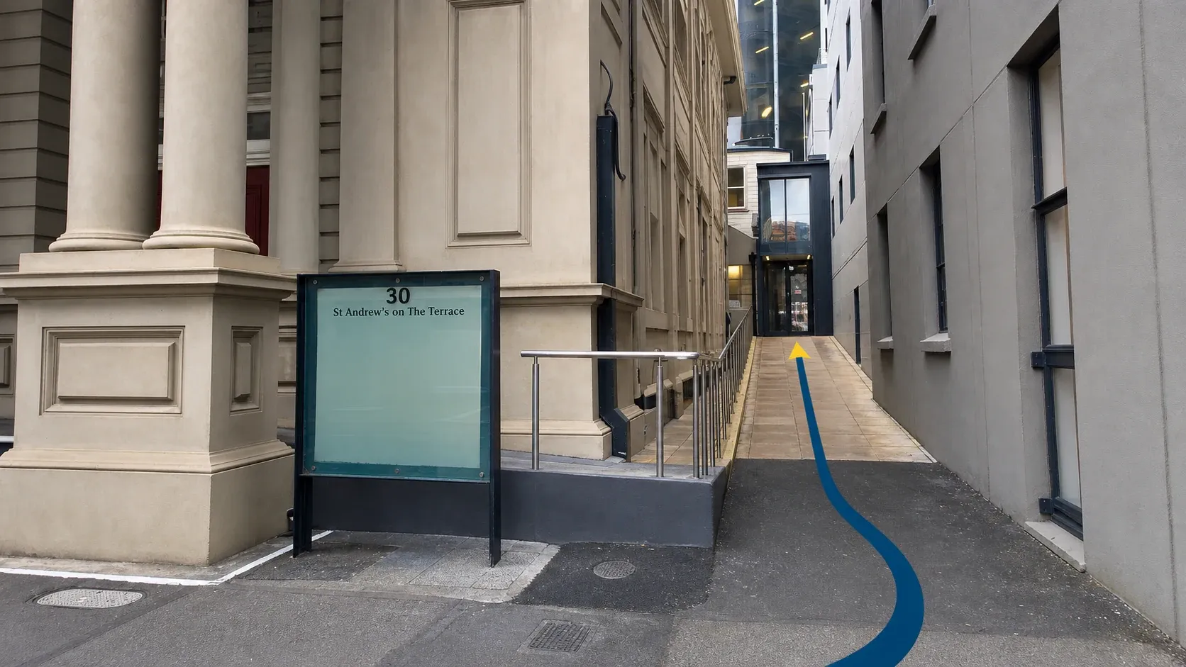 Wayfinding photo of St Andrew’s on The Terrace with a route cue to the alley beside the church